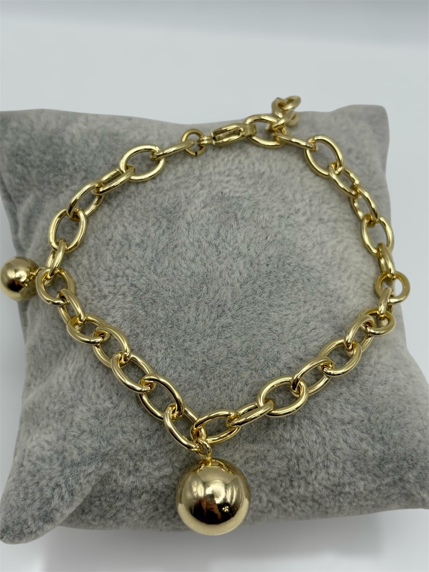 Pulsa ajustable 7 y 7/30 oro laminado 14k