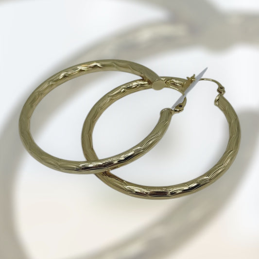 Argollas medianas laminada 14k