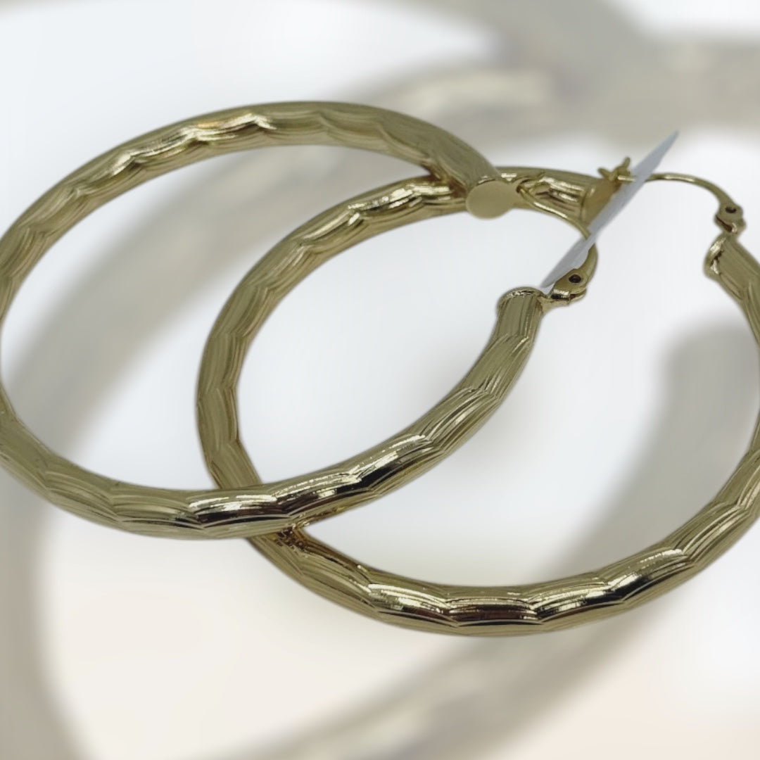 Argollas medianas laminada 14k